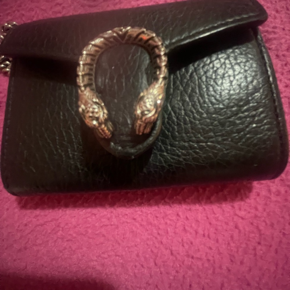 Gucci Black Leather Bag with Gold Accents